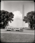 Washington DC circa  Streamlined street car passing Washington Monument